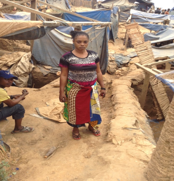 A person standing in a dirt area AI-generated content may be incorrect.